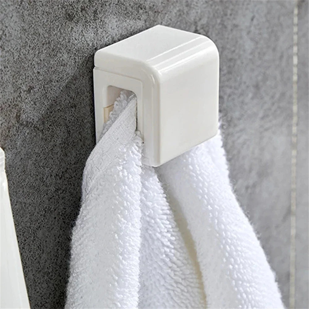 SqueezeHook™ – Wall-Mounted Tube Holder & Hanger