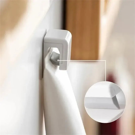 SqueezeHook™ – Wall-Mounted Tube Holder & Hanger